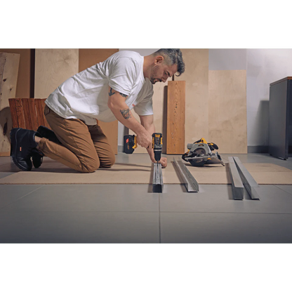 TRAPANO AVVITATORE CON PERCUSSIONE A BATTERIA